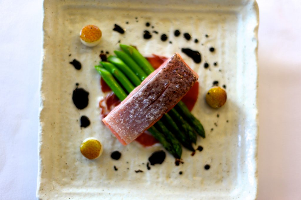 Poached Atlantic Salmon with Iberico Jamon, Asparagus and Coffee Oil